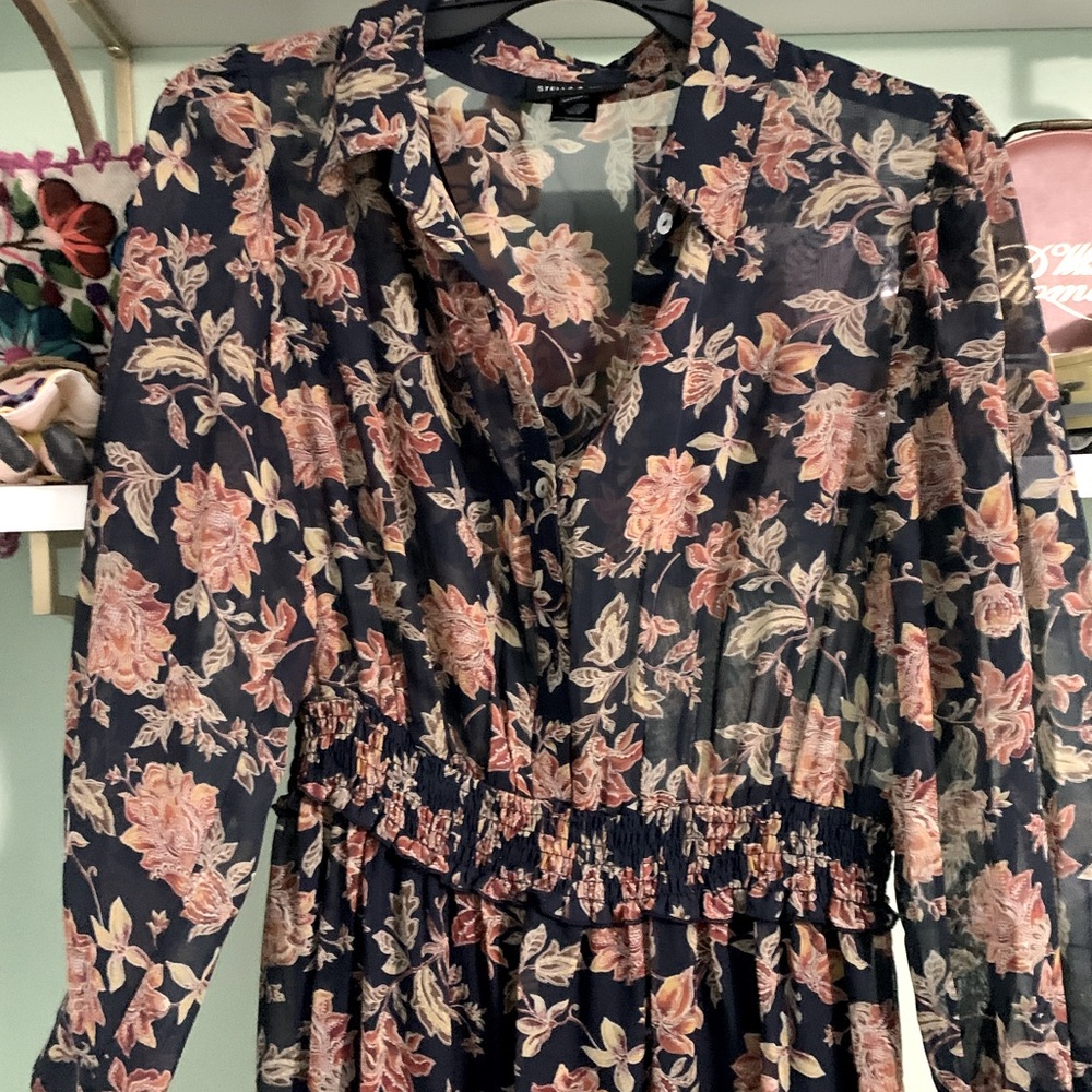 Beautiful navy blue dress. Brand new with tag. Great for any occasion.